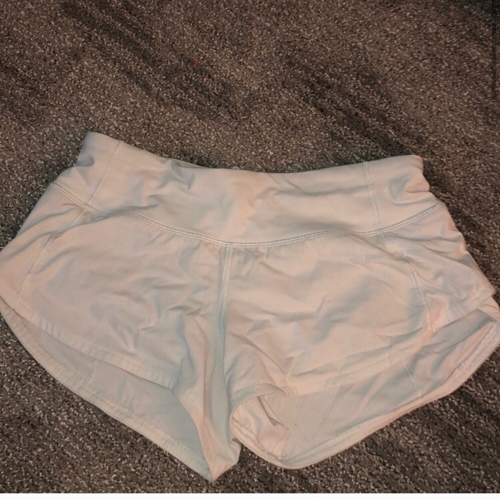 white lululemon shorts
